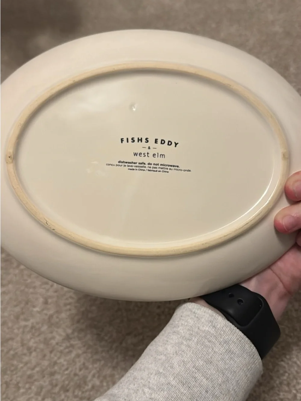 West Elm Cream Plate with Black Rim and Gold Script